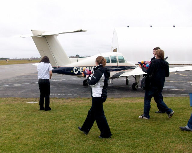 Caught!: Alexandra tries to avoid the water waiting for her after her flight.